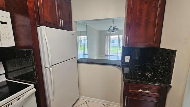 9911 Sandalfoot Boulevard 116, Boca Raton, FL 33428