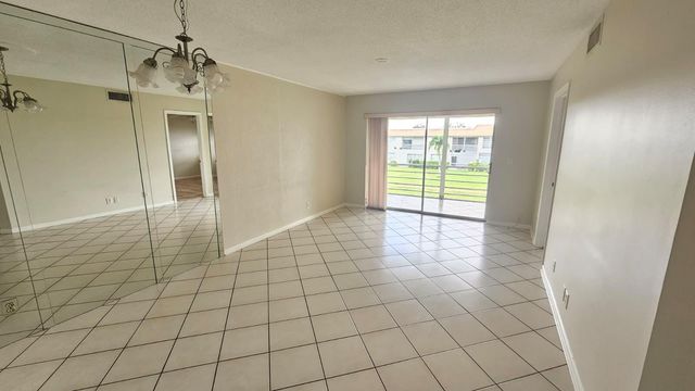 9911 Sandalfoot Boulevard 116, Boca Raton, FL 33428