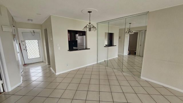 9911 Sandalfoot Boulevard 116, Boca Raton, FL 33428