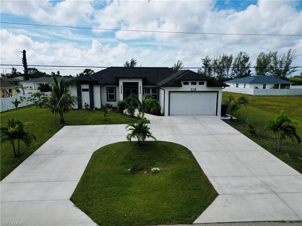 528 Jacaranda PKWY E, CAPE CORAL, FL 33909 — photo 2