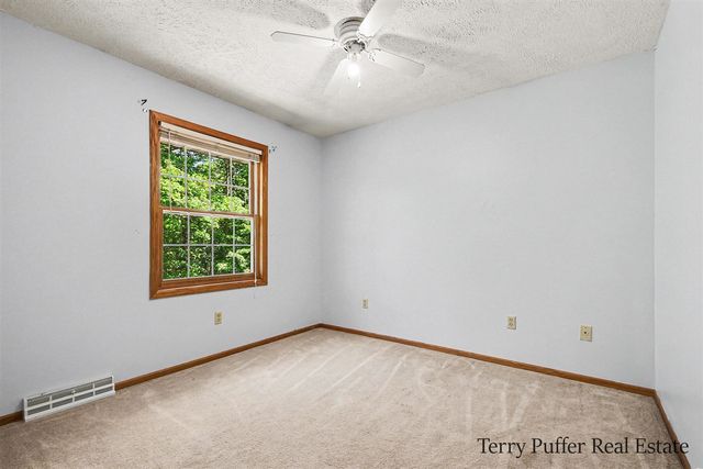 12080 Pine Cone Drive, Rockford, MI 49341