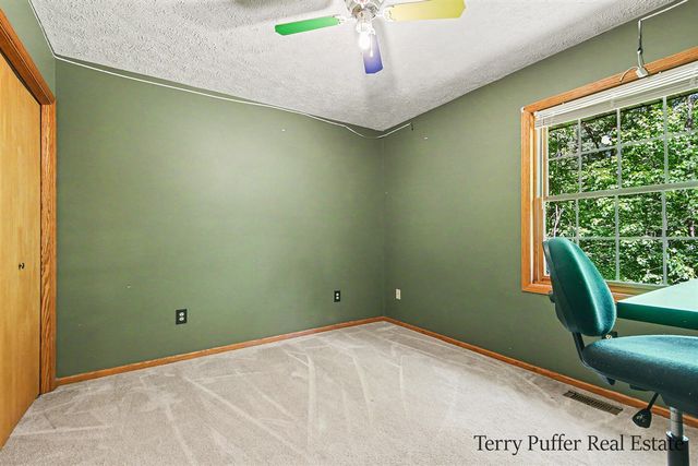 12080 Pine Cone Drive, Rockford, MI 49341