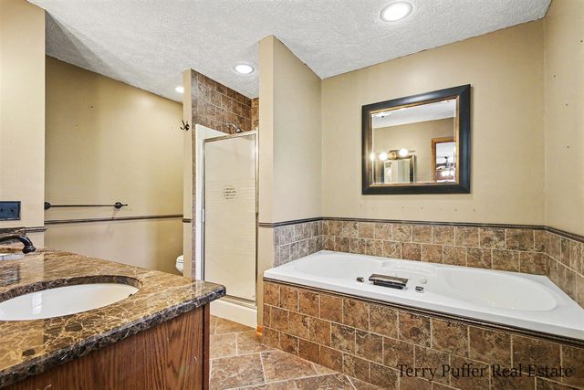 12080 Pine Cone Drive, Rockford, MI 49341