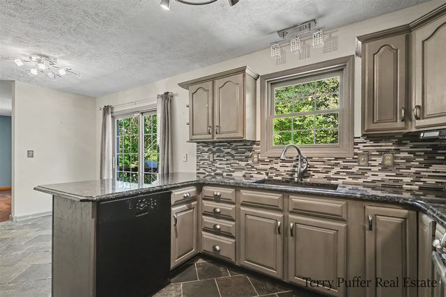 12080 Pine Cone Drive, Rockford, MI 49341