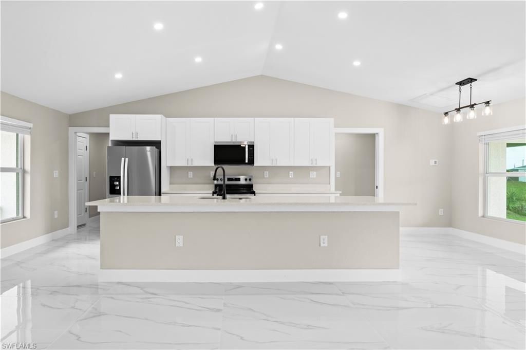 Image 2 of property listing at 2708 NW 22nd AVE, Cape Coral, FL 33993