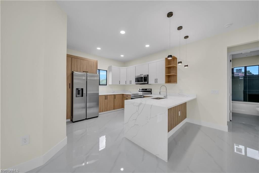 4016 9th ST SW, LEHIGH ACRES, FL 33976 — photo 5