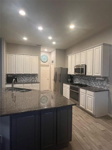 18411 Shallow Oak Court, Tomball, TX 77377