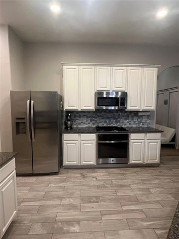 18411 Shallow Oak Court, Tomball, TX 77377