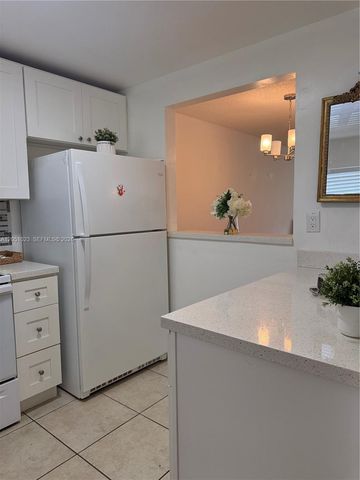 9540 Sunrise Lakes Boulevard 208, Sunrise, FL 33322