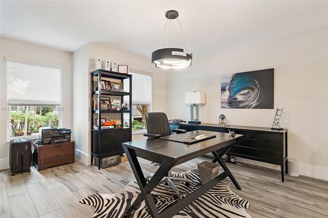 32 Grand Bay Circle, Juno Beach, FL 33408