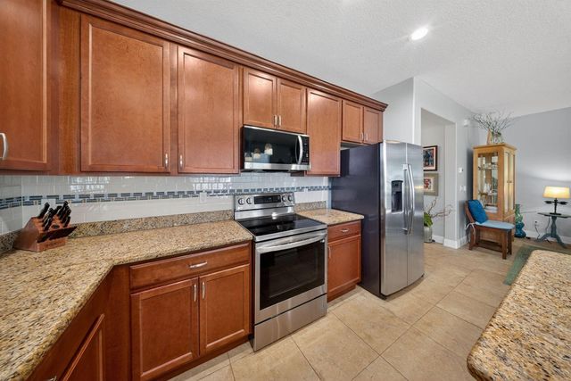 9701 SW Royal Poinciana Drive, Port St. Lucie, FL 34987