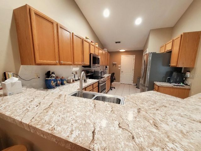 11355 AUTUMN WIND LOOP, Clermont, FL 34711