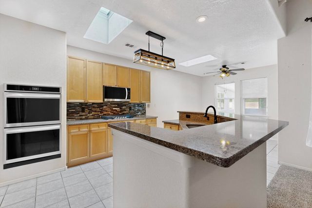 5013 BRIGHTON HILLS Drive NE, Rio Rancho, NM 87144