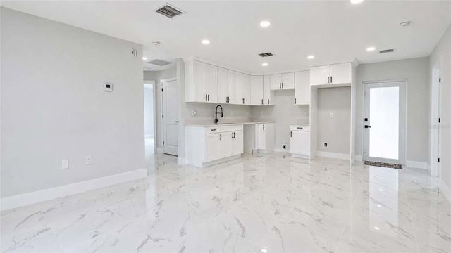1120 RAVENSWOOD STREET E, Lehigh Acres, FL 33974