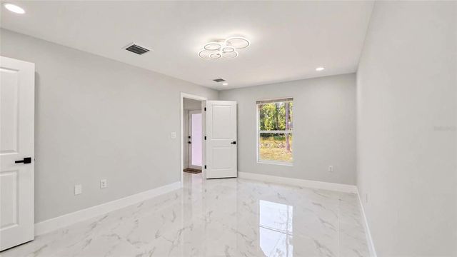 1120 RAVENSWOOD STREET E, Lehigh Acres, FL 33974
