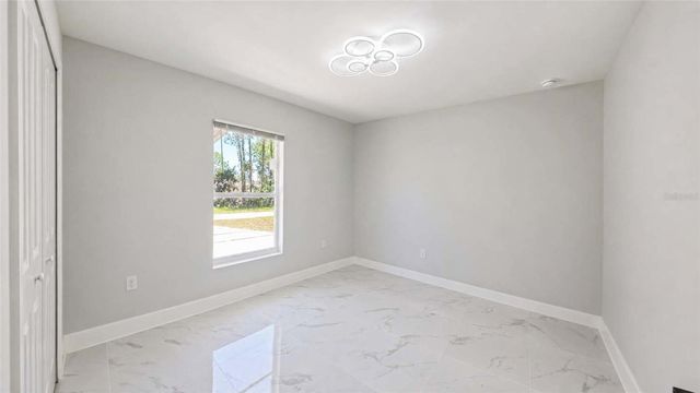 1120 RAVENSWOOD STREET E, Lehigh Acres, FL 33974