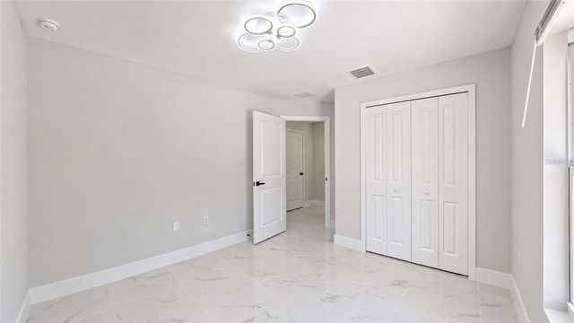 1120 RAVENSWOOD STREET E, Lehigh Acres, FL 33974