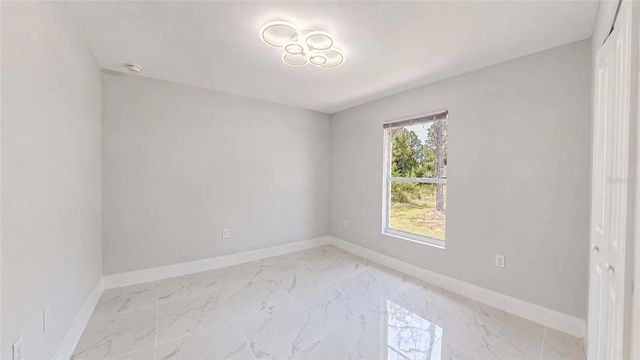 1120 RAVENSWOOD STREET E, Lehigh Acres, FL 33974