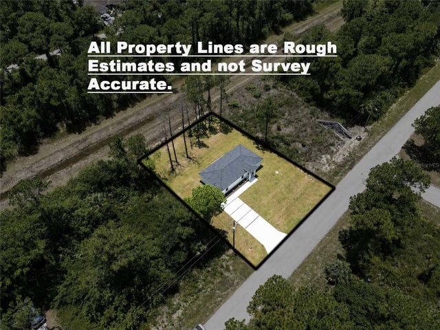 1120 RAVENSWOOD STREET E, Lehigh Acres, FL 33974