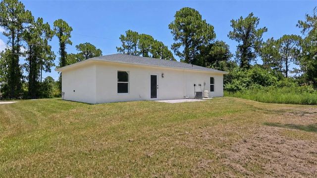1120 RAVENSWOOD STREET E, Lehigh Acres, FL 33974