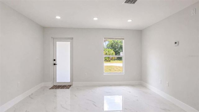 1120 RAVENSWOOD STREET E, Lehigh Acres, FL 33974