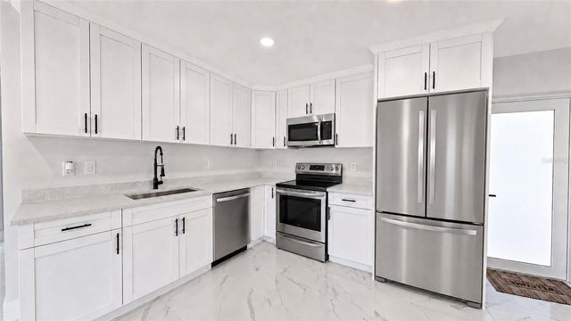 1120 RAVENSWOOD STREET E, Lehigh Acres, FL 33974