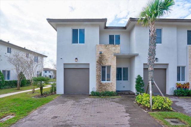 1451 Pioneer Way, Royal Palm Beach, FL 33411