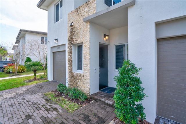 1451 Pioneer Way, Royal Palm Beach, FL 33411