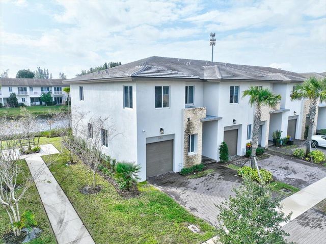 1451 Pioneer Way, Royal Palm Beach, FL 33411