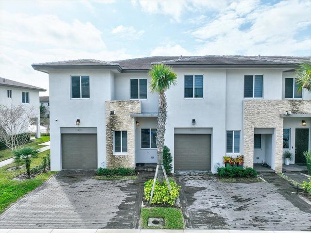 1451 Pioneer Way, Royal Palm Beach, FL 33411