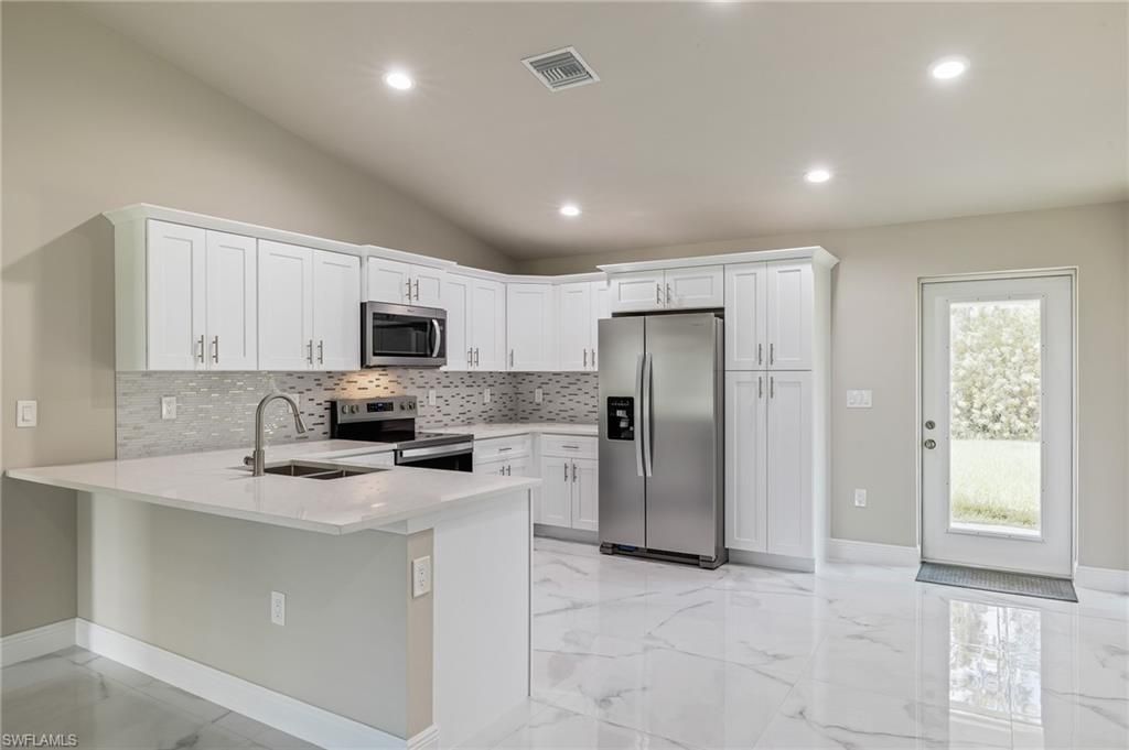 128 Sanborn DR, LEHIGH ACRES, FL 33972 — photo 2