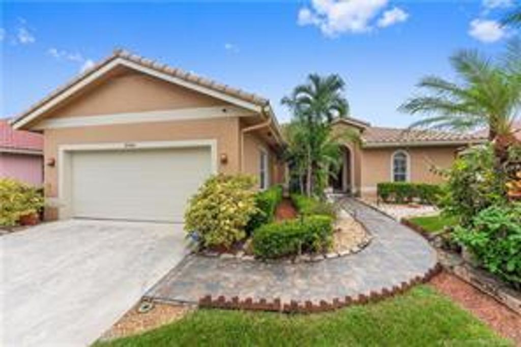 9140 Cypress Hollow Drive, Palm Beach Gardens, FL 33418