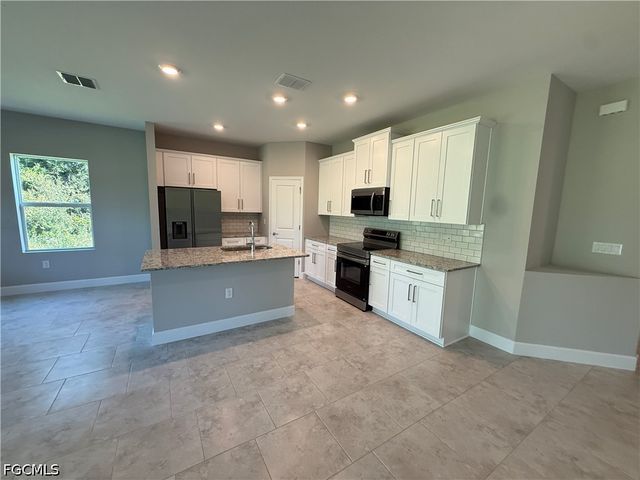 232 Bell BLVD S, Lehigh Acres, FL 33974