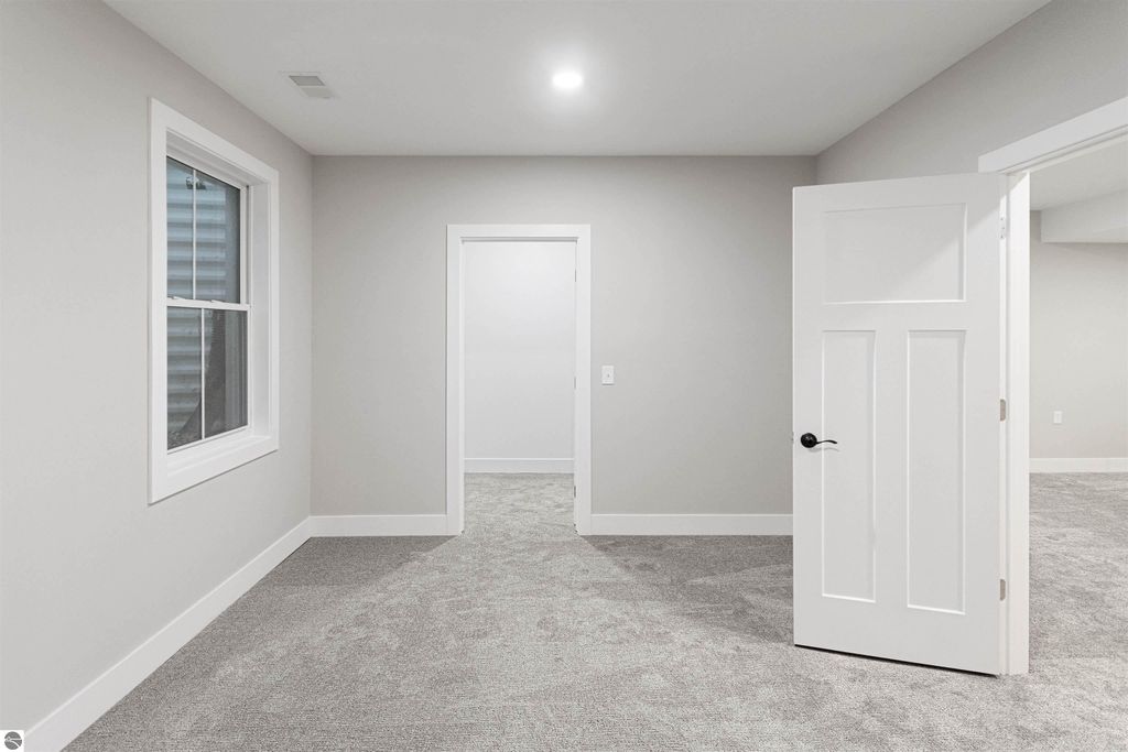 Image 49 of property listing at 11613 Whittington Street # 3, Traverse City, MI 49684