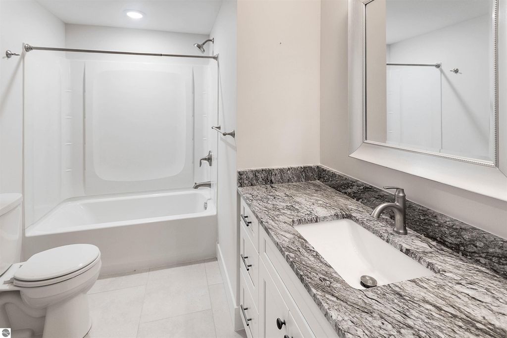 Image 51 of property listing at 11613 Whittington Street # 3, Traverse City, MI 49684