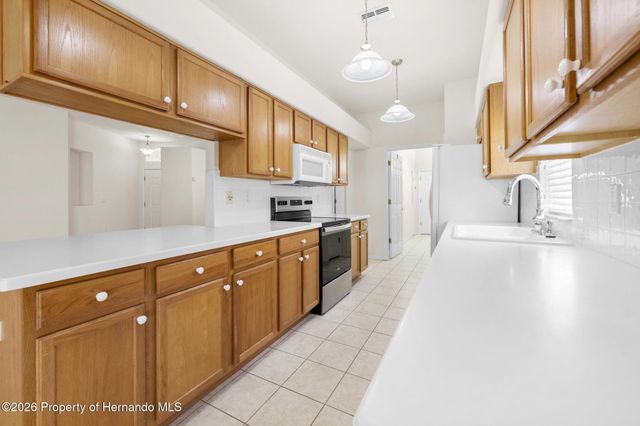 5592 Legend Hills Lane, Spring Hill, FL 34609