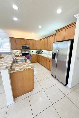 7762 Oak Grove Circle, Lake Worth, FL 33467