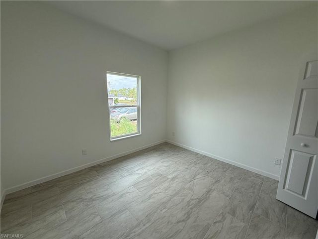 1103 W 10th ST, Lehigh Acres, FL 33972