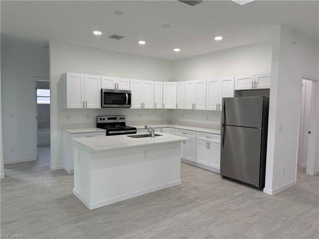 1103 W 10th ST, Lehigh Acres, FL 33972