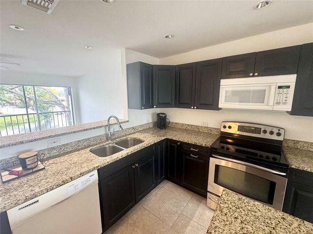 9201 TUDOR DRIVE C212, Tampa, FL 33615