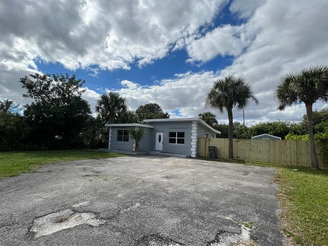 1883 Breezy Lane, West Palm Beach, FL 33417