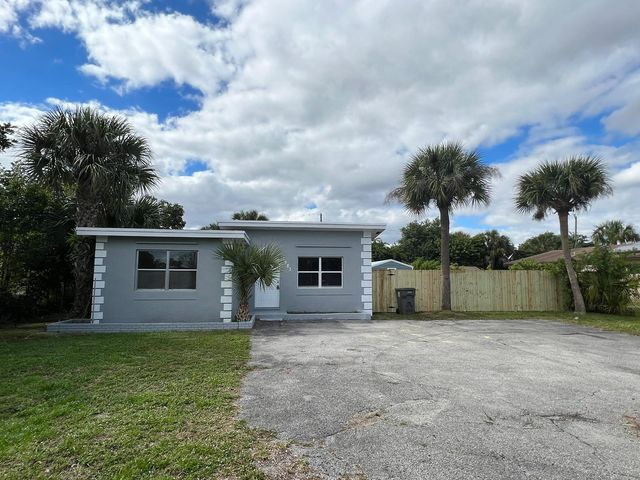 1883 Breezy Lane, West Palm Beach, FL 33417