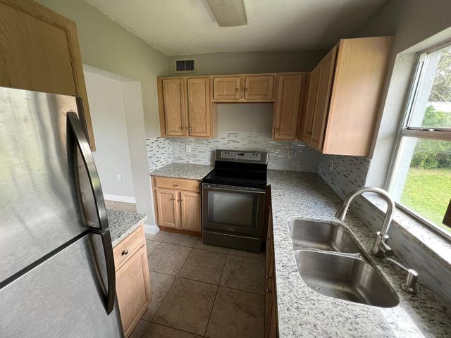 1883 Breezy Lane, West Palm Beach, FL 33417