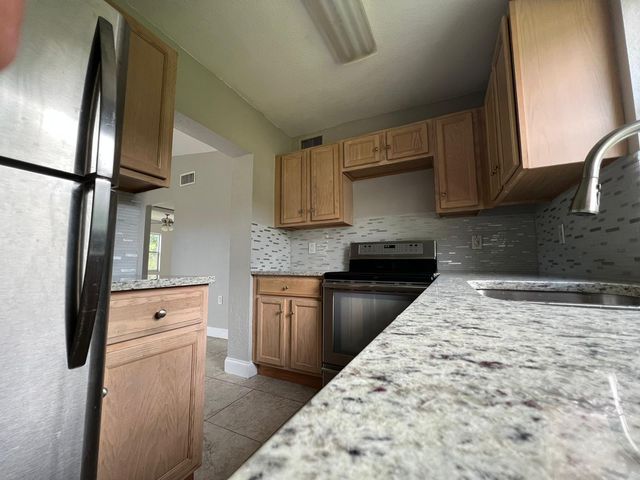 1883 Breezy Lane, West Palm Beach, FL 33417