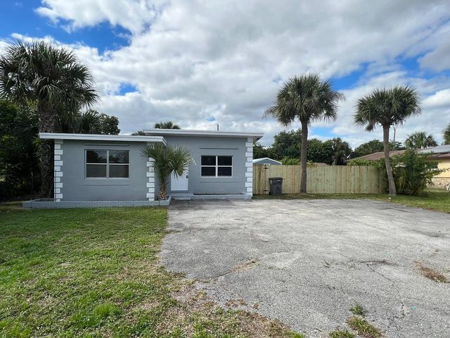 1883 Breezy Lane, West Palm Beach, FL 33417