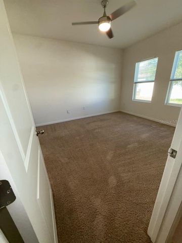 1014 WANDERER DRIVE, Deltona, FL 32738