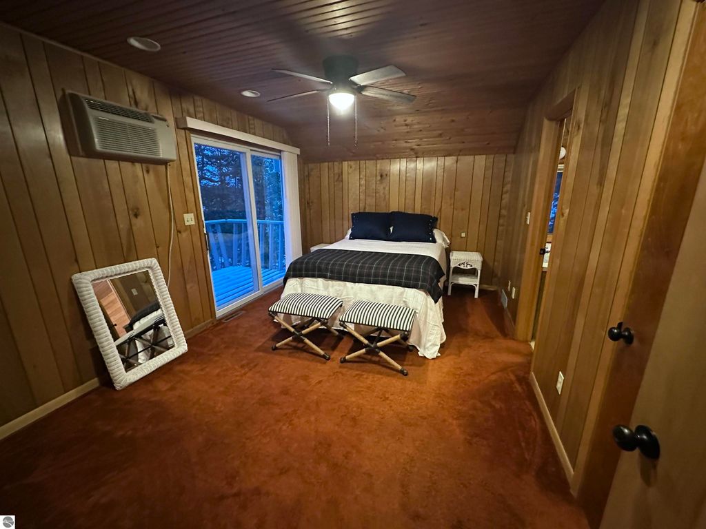 Image 15 of property listing at 7780 Elk Tip Drive, Rapid City, MI 49676