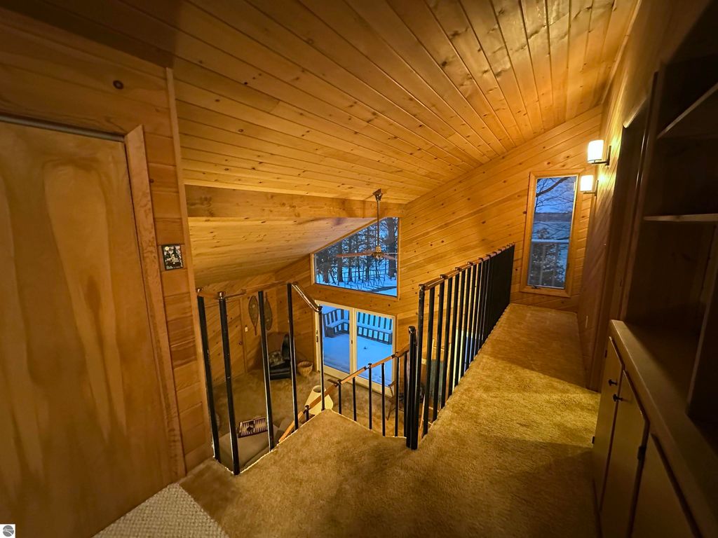 Image 17 of property listing at 7780 Elk Tip Drive, Rapid City, MI 49676