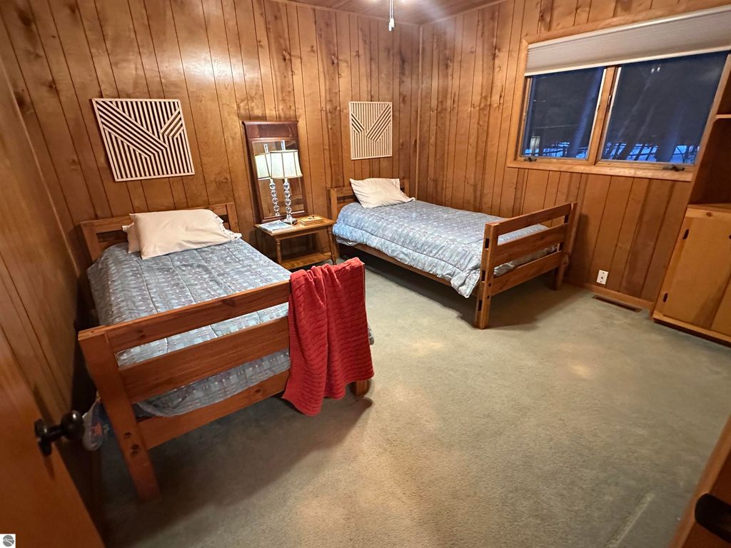 Image 18 of property listing at 7780 Elk Tip Drive, Rapid City, MI 49676