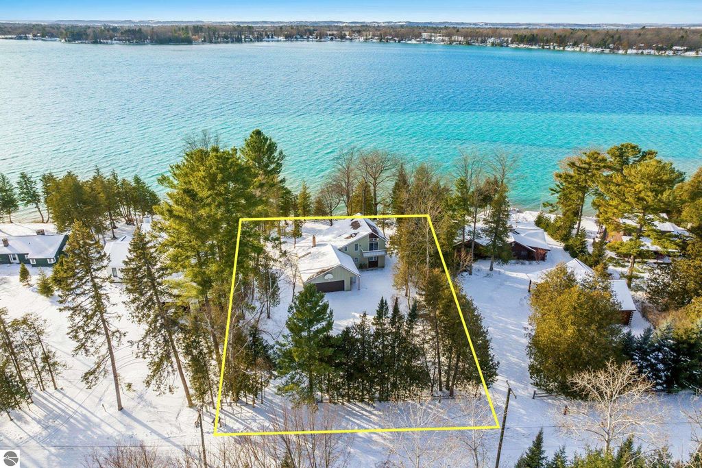 Image 2 of property listing at 7780 Elk Tip Drive, Rapid City, MI 49676